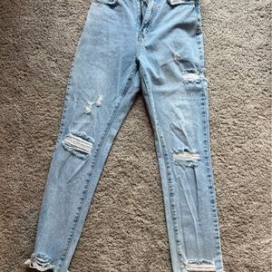 Distressed light wash jeans